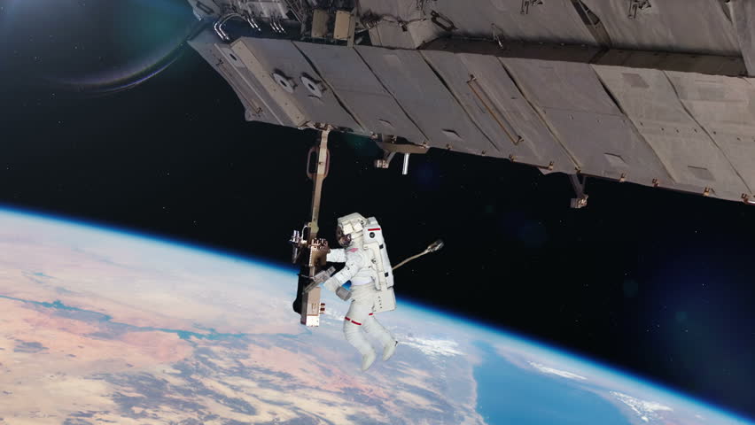 Astronaut Spacewalk Working On International Space Station Stock ...