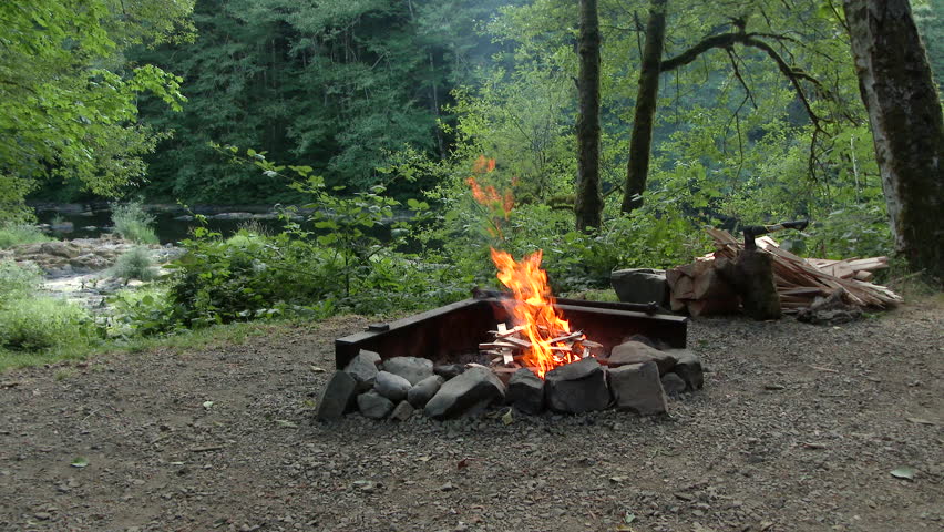 4k00 25campfire Starting In Fire Pit At Campground In The Pacific