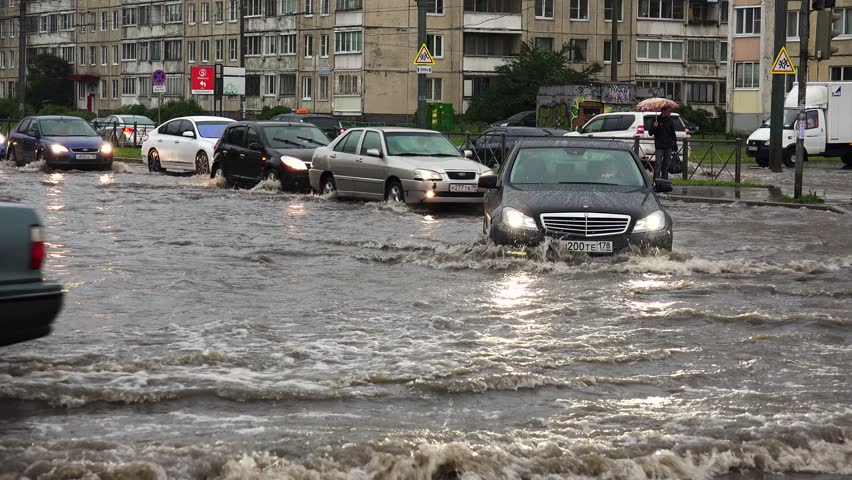 SAINT-PETERSBURG, RUSSIA - JUNE, 2015: Heavy Rain, Flood, Element In ...