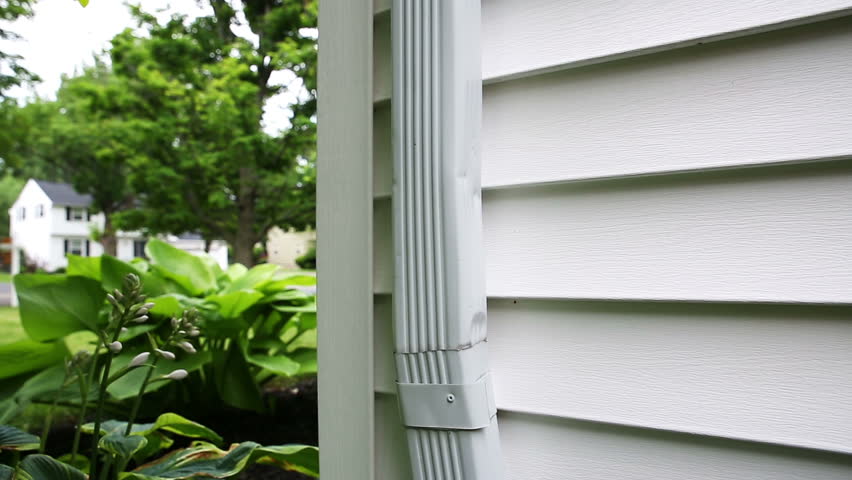 Gutter Corner Downspout Rise 2 Stock Footage 100 Royalty Gutter Corner Downspout Rise 2 Shots Rises On A Close Up Of For House System Vinyl Siding White