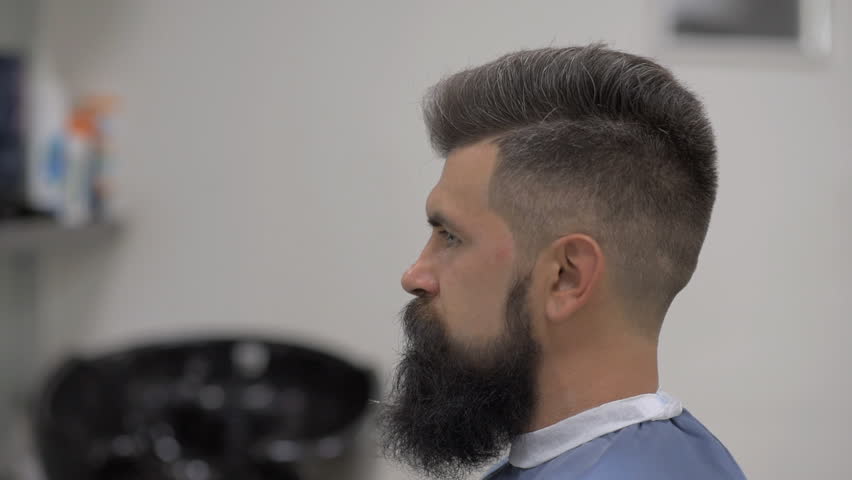 Stylish Tattooed Hairdresser Makes Hair Stock Footage Video 100