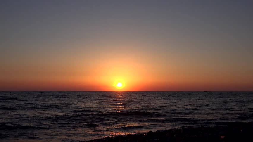 Beautiful Sunset Against Orange Sky Over Quiet Sea Waves Stock Footage ...