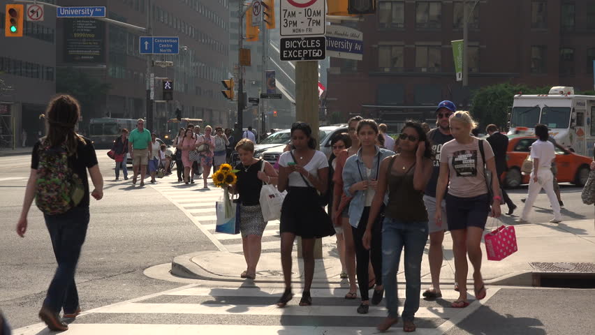 TORONTO, ONTARIO/CANADA - SEPTEMBER 03, Unidentified People Cross The ...