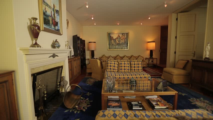 Hd00 11a Wide Angle Shot Shows A Living Room Scene Where Two