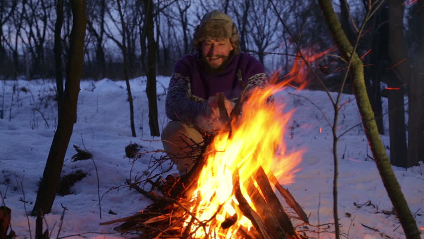 Bearded Man Warming His Hands By The Fire In Winter. Tourist Man ...