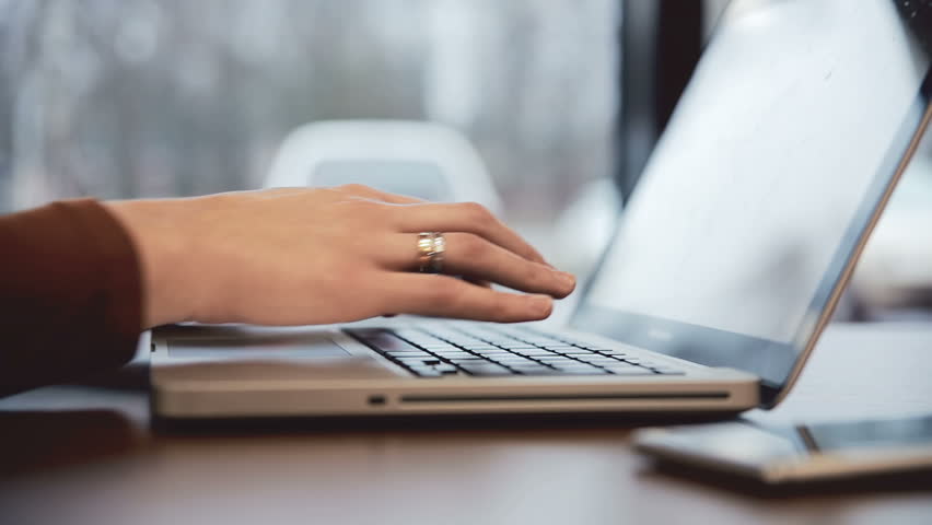 Closeup Of Woman Hand Typing On Laptop Keyboard With Mouse Stock ...