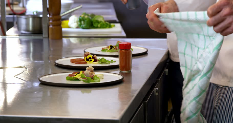 Restaurant Kitchen Video professional chefs arranging their schedule in a restaurant or Restaurant Kitchen Video professional chefs arranging their schedule in a restaurant or