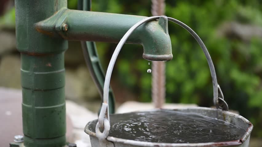 Water Pump With A Bucket Full Of Water Stock Footage Video 17033074 ...