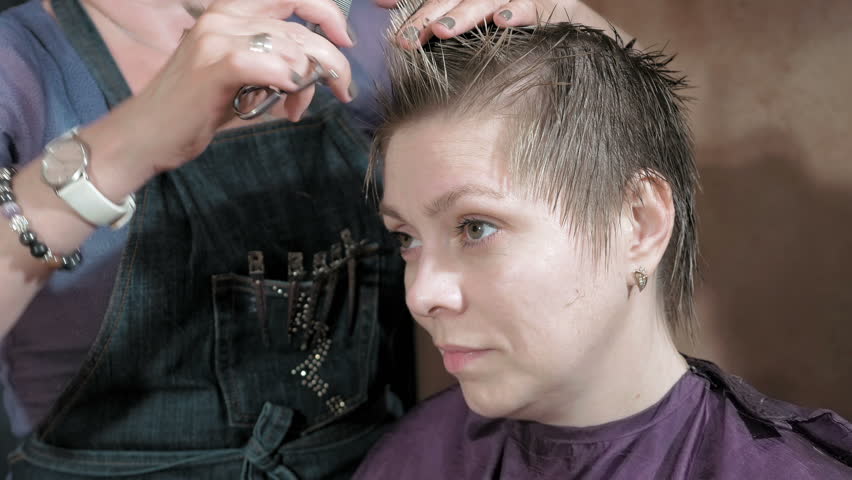 Hairdresser Cuts Combs And Styles Pretty Blond Woman Short Hair