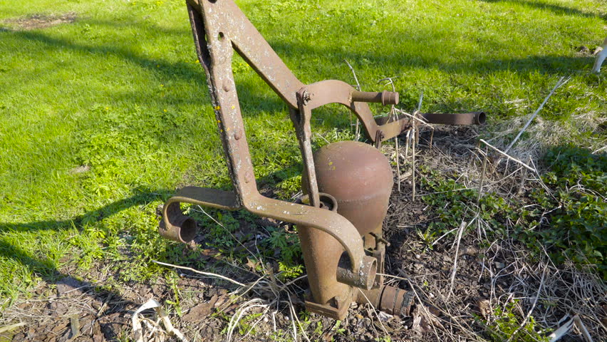 The Old Water Pump On Yard It Is Now A Rusty And Cannot Be The Old Water Pump On Yard It Is Now A Rusty And Cannot Be