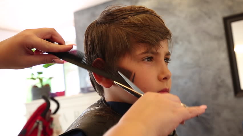 Young Boy Having a Haircut Stock Footage Video 100 