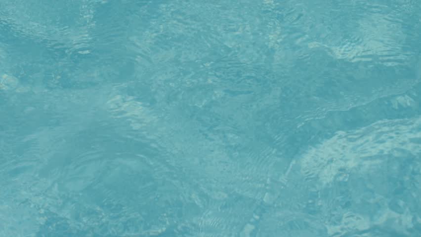 Pool Water Splash jacuzzi water in swimming pool with spa. close up jacuzzi blue Pool Water Splash jacuzzi water in swimming pool with spa. close up jacuzzi blue