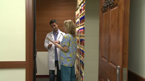 480px x 270px - Doctor and Nurse in Filing Stock Footage Video (100% Royalty-free ...