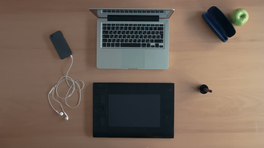 Desk Top View moving office supplies making place for text + coffee break on Desk Top View moving office supplies making place for text + coffee break on