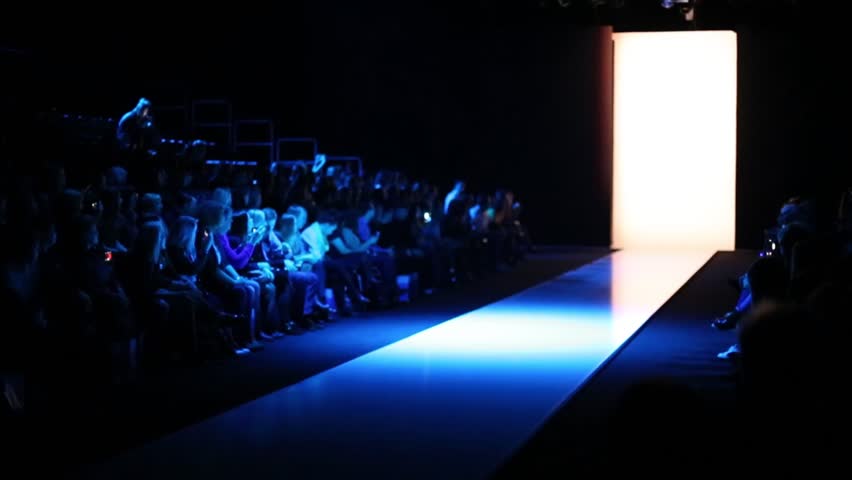 Many People Are Waiting For Beginning Of Fashion Show, Sitting In Dark ...