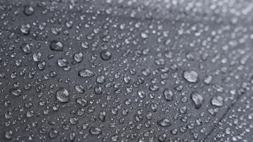 Close-up Waterproof Umbrella Surface With Tiny Rain Droplets Slow 