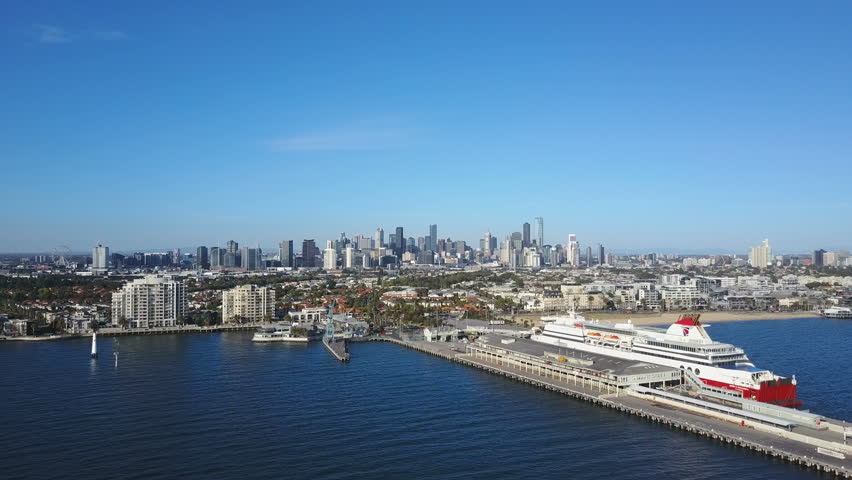 Orbit Shot Of Pier In Port Melbourne And View Of Skyline In CBD Stock ...