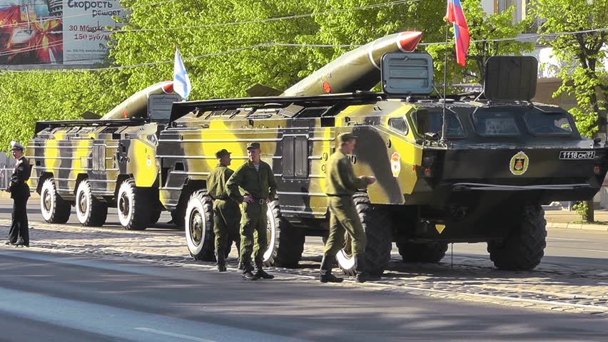 NEW YORK - FEB 15, 2015: FDNY Firefighters Talking In Group Huddle Down