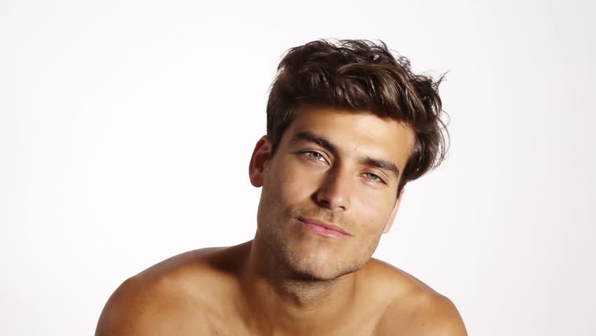 Close Up Portrait Of Caucasian Male Model Posing On Gray Background