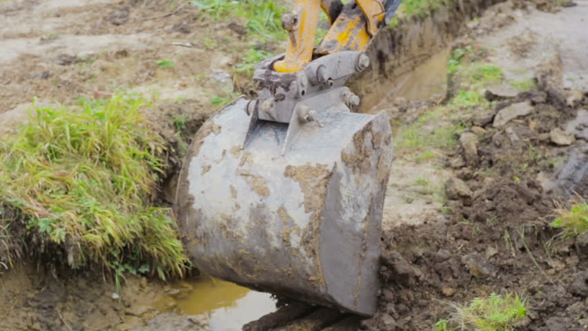 Excavator Bucket Digging A Drainage Stock Footage Video 100 Royalty Free 24494390 Shutterstock