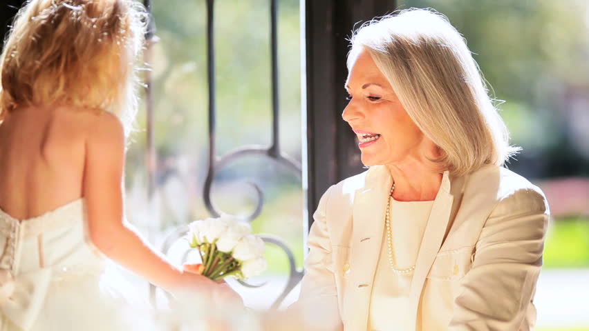Little Bridesmaid With Elegant Grandmother Stock Footage Video