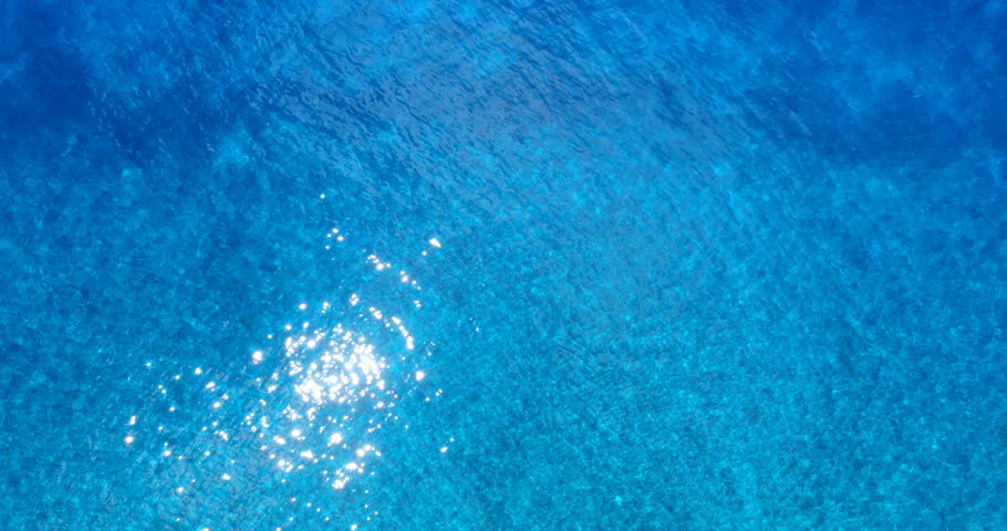 Crystal Clear Blue Ocean Water Filmed From Overhead. Stunning Water ...