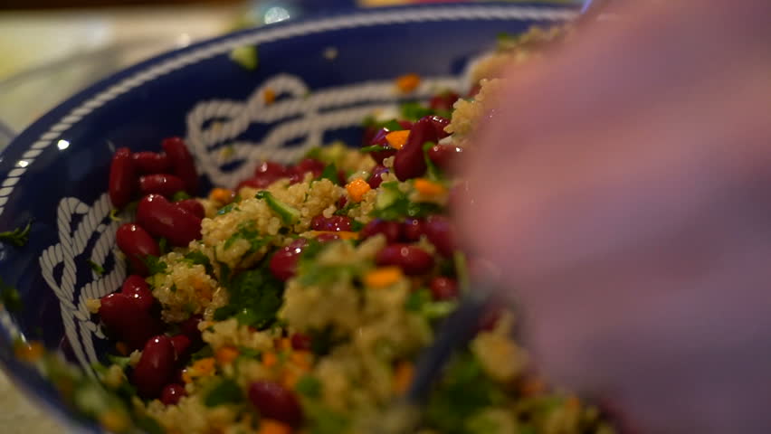  A vibrant quinoa salad with mixed vegetables and a tangy dressing