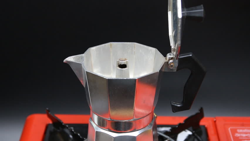 Moka Pot Coffee Maker On Orange Stock 