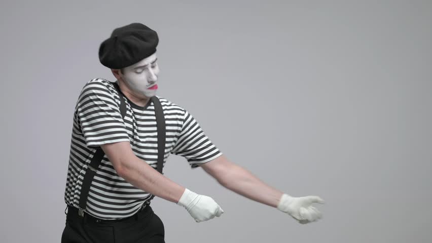 Young Happy And Funny Mime Being Romantic And Saluting An Invisible ...