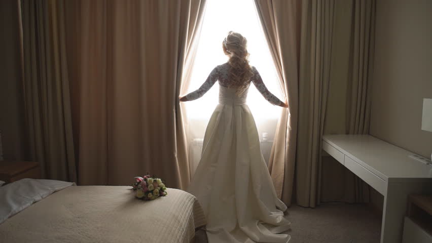 Beautiful Bride Opens The Curtains Stock Footage Video 100