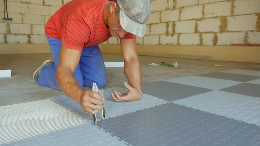 Laying Rubber Floor Tiles Stock Footage Video 100 Royalty Free