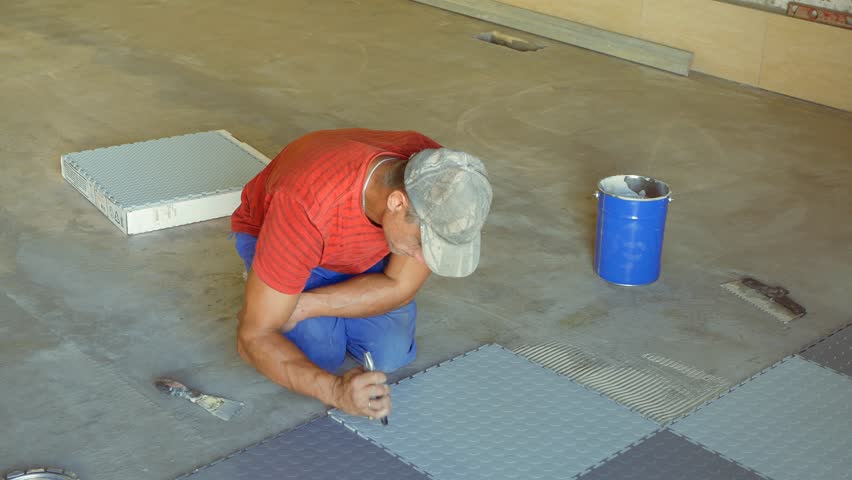 Laying Rubber Floor Tiles Stock Footage Video 100 Royalty Free
