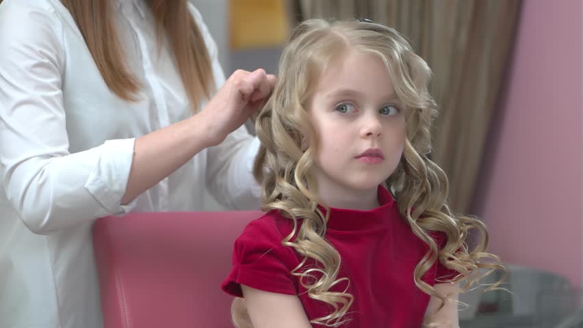 Cute Little Girl Hairdresser Caucasian Child With Blonde Hair