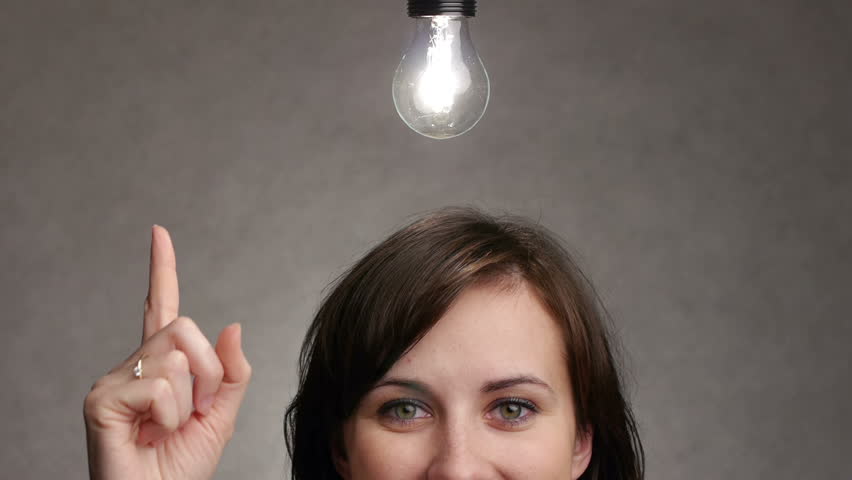 Bulb Lights up Over a Stock Footage Video (100% Royalty-free) 3099580