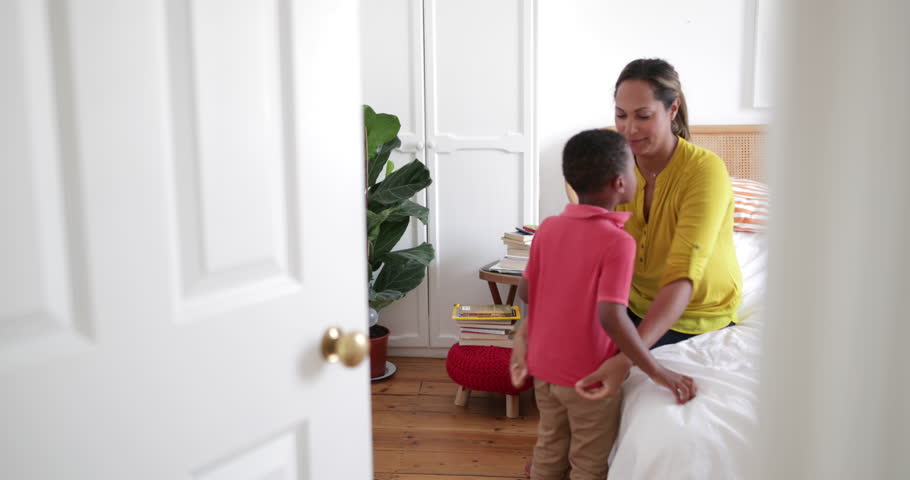 Mother Helping Son Dress In Stock Footage Video 100 Royaltyfree