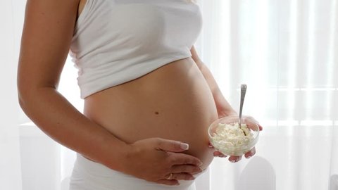 Future Mother Eats Dairy Products Stock Footage Video 100