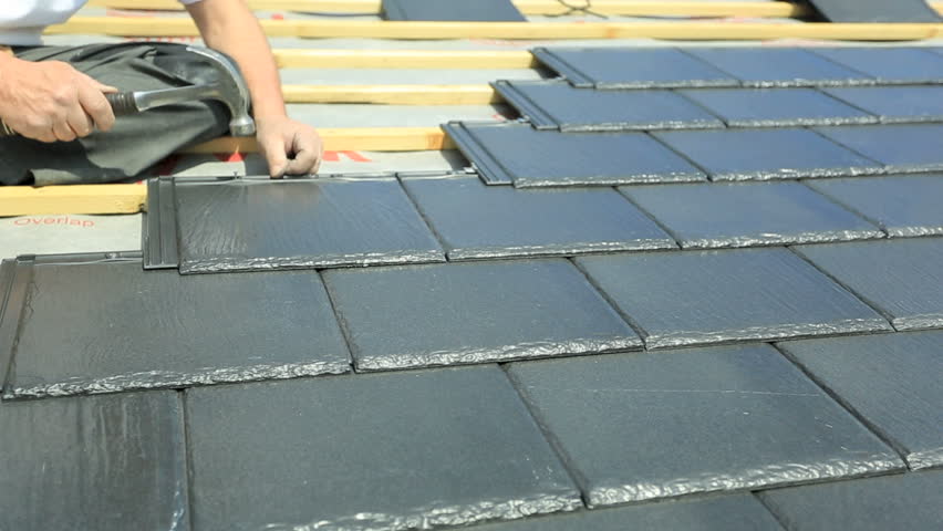 Roof Tiler Installing Slate Tiles Stock Footage 100 Royalty Roof Tiler Installing Slate Tiles On Property