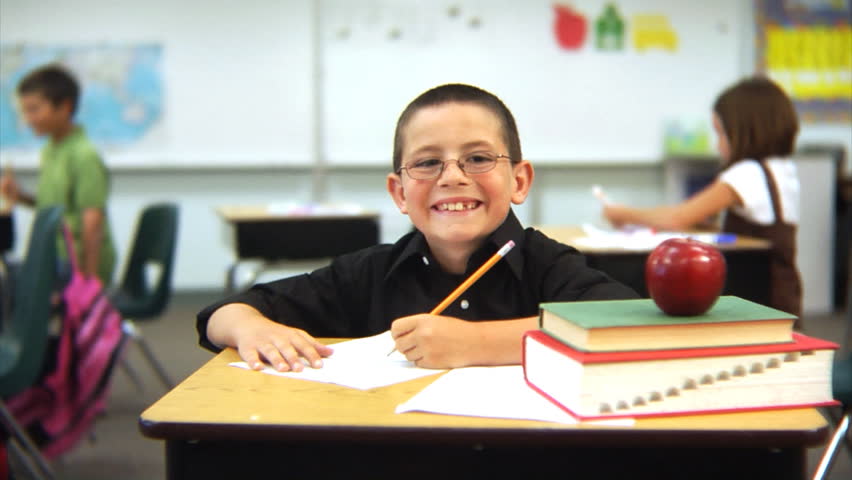 Young Boy Sitting At School Stock Footage Video 100 Royalty