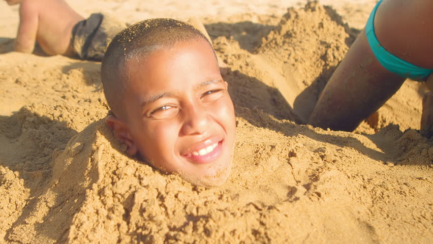 Stock Video Of A Young Boy Gets Buried In  4776560  Shutterstock