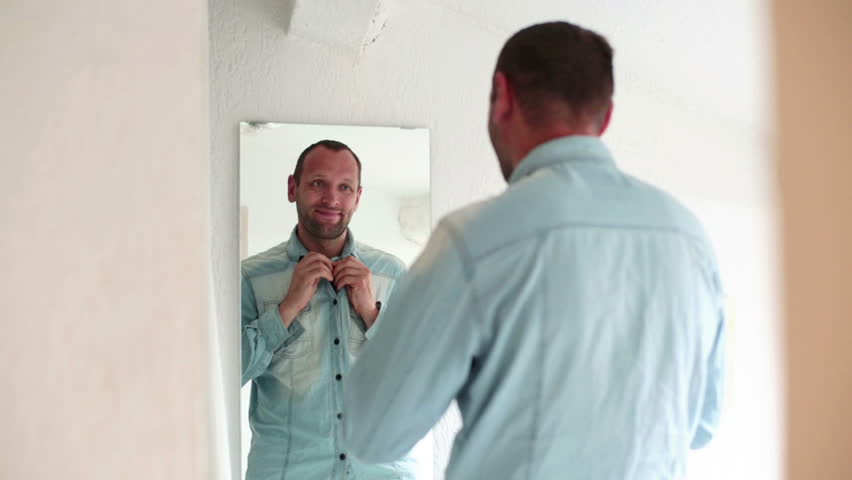 Bilderesultat for man in front of mirror