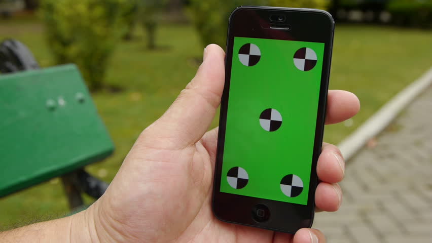 Smart Phone Held By Hands Stock Footage 100 Royalty Free Smart Phone Held By Hands At The Park Green Screen Chroma Key Close Up Tracking Motion Vertical Tile Floor Grass Background