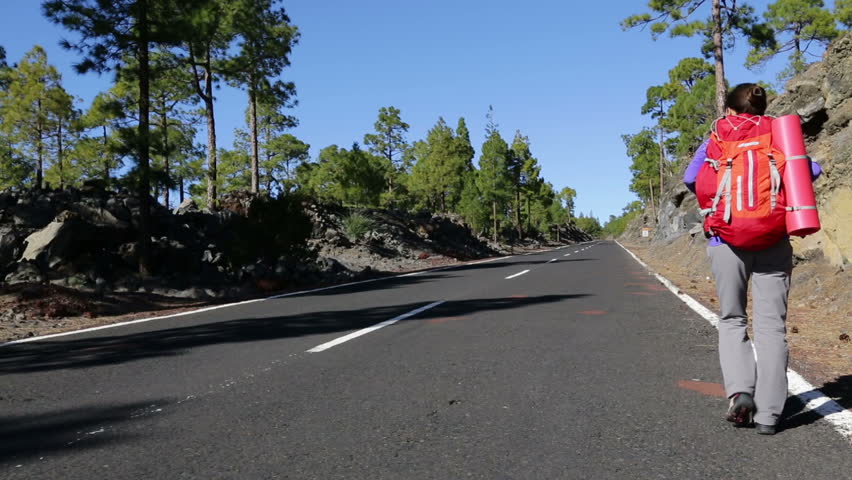 Hitchhikers By Side Of Road >> Hitchhiker Woman Backpacker Happy Walking Arkivvideomateriale 100 Hitchhikers By Side Of Road >> Hitchhiker Woman Backpacker Happy Walking Arkivvideomateriale 100