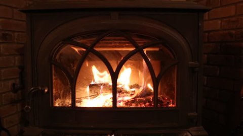 Gas Fireplace Burns With Wooden Arkivvideomateriale 100