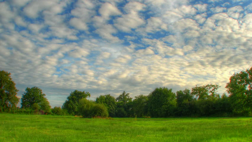 Stock Video Clip of Blue sky over fields, HD time lapse | Shutterstock