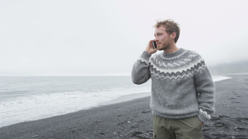 Handsome Man Walking Black Sand Beach On Iceland Wearing Icelandic ...