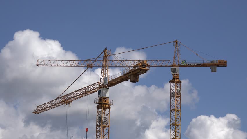 4K Video Time Lapse : Construction Site With Cranes And Blue Sky ...