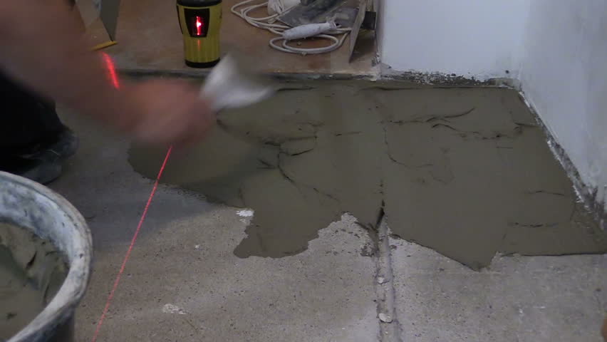 Stock video of Laying Ceramic Floor Tiles - Man Hand Spreading ... Stock video of Laying Ceramic Floor Tiles - Man Hand Spreading ...