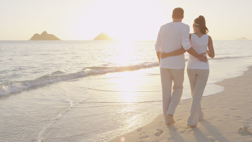 Walking On Beach Enjoying Sunrise Vacation Royalty Free Video Walking On Beach Enjoying Sunrise Vacation Casual In Love Walk Beautiful Summer Woman And Man Holidays Travel